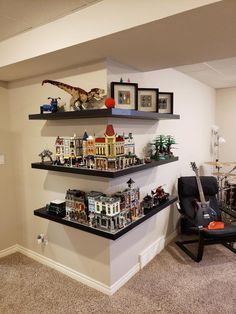 two shelves with legos on them in a living room