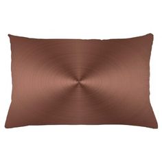 a brown pillow on a white background