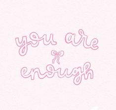 the words you are enough written in pink ink