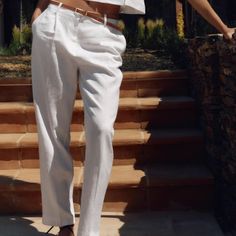 Dimensions: Waist: 33.0" Hips: 45.0" Inseam: 30.0" Composition: Outer Shell 50% Linen, 50% Viscose High Rise With Darts Pants. Linen Blend Pants. Front Pockets. Back False Welt Pockets With Buttons. Straight Leg. Belt Detail. Front Zip. Interior Button And Hook Closure. White Ankle-length Summer Pants, White Summer Ankle-length Pants, Relaxed Fit White Cargo Pants, White Linen Ankle-length Bottoms, Chic White Tapered Leg Bottoms, White Linen Pants For Spring, White Straight Leg Bottoms For Day Out, White Summer Pants For A Day Out, Zara White Tapered Leg Pants