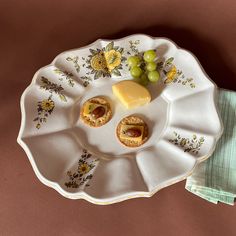 small appetizers are arranged on a decorative plate