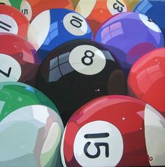 several pool balls with numbers painted on them