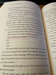 an open book with some type of text on the page in it's center