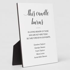 this candle burns memorial card is designed to look like it has been placed on a stand