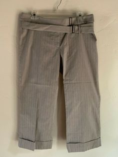 Item Details NEW $206 Tom K Nguyen Seashell Cropped Wide Leg Pants US Women's Size 10 Light gray with darker micro stripes in a dot pattern.  Cropped wide cuffed legs.  Smooth cotton + silk blend material. Zip fly with hidden button closure. Adjustable double belt design at waist. Brand new with tags. Made in USA. Retails $206. Material: 84% cotton, 16% silk All of my items are guaranteed 100% AUTHENTIC or your money back. Double Belt, Cropped Wide Leg Pants, Pants Cotton, Belt Design, Dots Pattern, Cotton Silk, Light Gray, Leg Pants, Wide Leg Pants