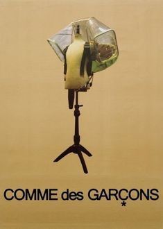 a poster with an image of a camera on a tripod and the words, comme des garcos