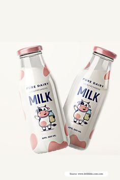 two bottles of milk sitting next to each other