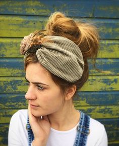 Khaki beige green fleece lined turban head band with a vintage style floral design embellishment. A real statement piece with a standard width inner Alice band attached within the lining to provide an easy to wear design. These designs are based on the 1940s land girl style and 1950s Rockabilly fashions. Our range of turban bands are the perfect easy to wear accessory and are worn exactly as an Alice band finishing behind the ears. (These bands do not go all the way around the back of the head, Bohemian Turban With Matching Headband, Adjustable Brown Bohemian Turban, Hippie Style Headwrap, Bohemian Green Headwrap As Headband, Bohemian Green Headwrap Style Headband, Hippie Style Headwrap One Size, Green Bohemian Headband, One-size Hippie Style Headwrap, One Size Hippie Style Headwrap