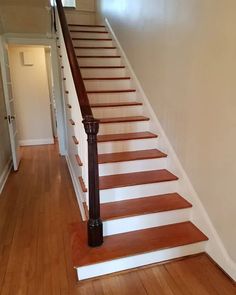 the stairs in this house are painted white