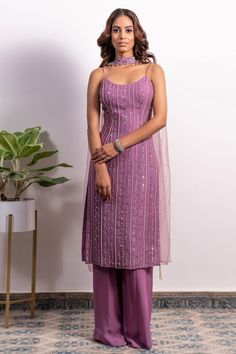 Women's outfit,Kurta pant set, Silky bindra onion colour set Net Straight Kurti Designs, New Kurta Set Design Women, Kurti Ideas For Wedding, Sleeveless Kurti Pants Design, Suit Piece Design Women, Embroidery Net Fabric Dresses, One Piece Indian Dress Outfit, Sleeveless Straight Kurti Designs, Purple Ethnic Wear Women