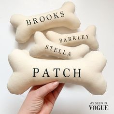 there are three bones with names on them that say, brooks, stella, and patch