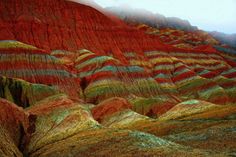 the colorful hills are painted with different colors