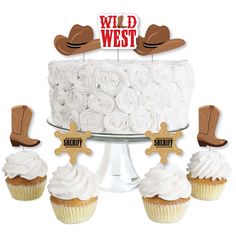 cupcakes with cowboy hats on top and white frosting are arranged in front of a cake