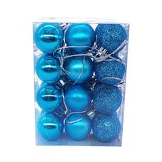 blue and silver ornaments in a clear box