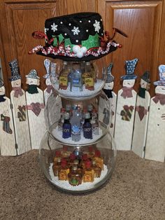 three tiered glass bowl filled with various items