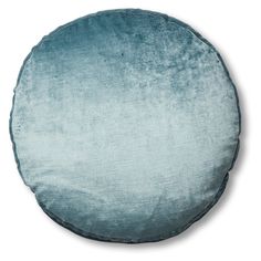 a round blue cushion on a white background