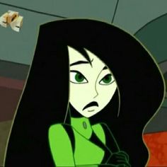 an animated woman with long black hair and green eyes