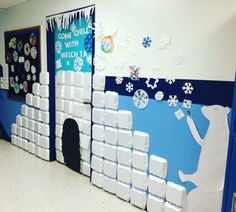 this is an image of a hallway decorated with toilet paper and snowmen on the walls