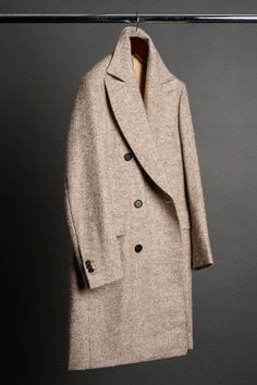 A handmade bespoke overcoat crafted from a luxurious fabric with a unique blend of fibers (wool, alpaca, mohair, silk and nylon) to give you the ultimate do-it-all coat. Wool gives it lasting performance and versatility. Alpaca gives it softness and warmth. Mohair gives it a crisp drape with natural wrinkle-resistance. Silk gives it a luster and natural sheen. And nylon gives it strength and durability to last the test of time. You will love this coat - it will elevated your entire wardrobe and you will wear it for many years to come. Beige Wool Coat For Winter Tailoring, Formal Neutral Wool Outerwear, Elegant Long Neutral Wool Coat, Beige Long Wool Coat With Concealed Placket, Neutral Long Wool Coat, Beige Wool Coat With Notch Lapel, Beige Wool Coat For Tailoring, Beige Notch Lapel Wool Coat, Elegant Brown Tweed Wool Coat