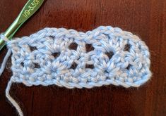 the crochet stitch is being worked on