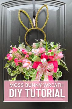 a bunny wreath with pink flowers and green leaves on the front door for diy easter decor