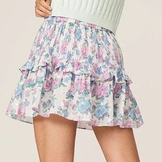 Ruffled in their dreamy Sea Orchid floral cotton, the label's Ignacia mini skirt is a mood-boosting favorite for summer. Elasticized waistband Pull-on style. Fabric: 100% cotton Hand wash Imported Feminine Floral Print Summer Skort, Floral Print Cotton Tiered Mini Skirt, Cotton Mini Skirt For Spring Brunch, Cotton Floral Print Tiered Mini Skirt, Spring Brunch Mini Skirt With Ruffles, Summer Garden Party Skirt With Ruffle Hem, Summer Floral Print Mini Skirt For Brunch, Floral Print Summer Mini Skirt For Brunch, Floral Print Mini Skirt For Summer Brunch