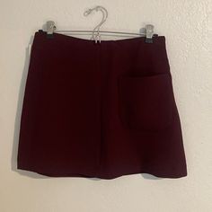 Burgundy/Maroon Mini Skirt. Never Been Worn. Still Has Tags. High Waisted With Side Zipper. Perfect Holiday Party Skirt! Chic Burgundy Skirt For Work, Red Mini Skirt With Pockets, Chic Burgundy Lined Skirt, Casual Burgundy Summer Skirt, Chic Burgundy Skirt For Night Out, Burgundy Skirt For Fall, Burgundy Mini Skirt With Lined Detail, Burgundy Lined Mini Skirt, Burgundy Mini Skirt With Lining