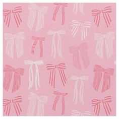 a pink background with white bows on it