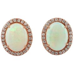 Handcrafted from 18-karat gold, these stud earrings are set with .24 carats of diamonds and 2.2 carats Ethiopian opal. FOLLOW MEGHNA JEWELS storefront to view the latest collection & exclusive pieces. Meghna Jewels is proudly rated as a Top Seller on 1stDibs with 5 star customer reviews. All items manufactured by us are handmade and can be customized or redesigned. Composition Size-12X10 MM Total Weight-3.3 Gold Weight(Gms)-2.812 Diamond Wt(Cts)-0.24 Ethiopian Opal Wt(Cts)-2.2 Opal Stud Earrings, Handmade Gemstone Jewelry, Oval Stud Earrings, Opal Earrings Stud, Opal Studs, Jewelry Christmas, Gemstone Jewelry Handmade, Christmas Gift Jewelry, Opal Gemstone