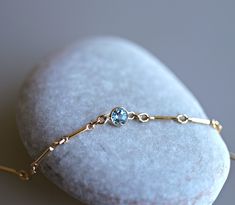 "14k gold filled dainty chain layering bracelets with real gemstones. Perfect for stacking with other bracelets or wear alone. It's a lovely birthday gift, Christmas gift or bridesmaids gift. This bracelet is a custom size and NO RETURN or EXCHANGES on this item. We accept bracelets for resizing if necessary - additional fees may apply. You can choose your bracelet among 6 different type of bracelet with gemstones and length from drop down menu. Gemstones setting with 14k solid gold bezel. 1- Ma Layering Bracelets, Chain Layering, Dainty Gold Chain, Topaz Bracelet, Peridot Bracelet, Blue Topaz Jewelry, Citrine Bracelet, Blue Topaz Bracelet, Gems Bracelet