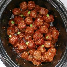 the meatballs are cooked and ready to be eaten in the crockpots