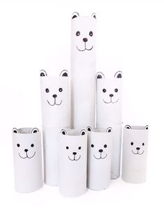 a bunch of toilet paper rolls with faces drawn on them in the shape of animals