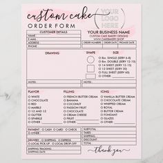 the custom cake order form is displayed on a marble surface with pink and black ink