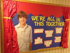 a bulletin board with a man's face and words on it that say we're all in this together