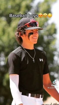 a baseball player with his face painted to look like he's smiling