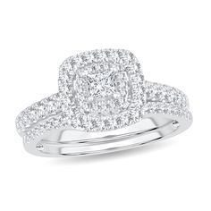 a diamond engagement ring set on top of a white background