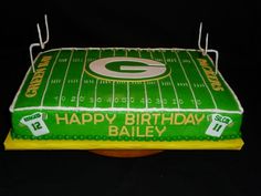 a green bay packers birthday cake with the number 12 on it