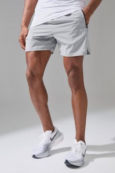 A gym essential you need gym shorts are an essential in your everyday wardrobe, especially in your fitness and casual wear. These shorts are not just about comfort and ease, they are designed for the active lifestyle, whether you're hitting the gym or going for a run with your mates. Our range includes a variety of styles, such as leggings shorts for optimal performance, lightweight running shorts for agility, and stylish, relaxed-fit shorts for everyday wear. The colour palette ranges from classic neutrals to bold shades making it easy to team up with your favourite gym tee and sneakers. Athletic Shorts With Built-in Shorts For Gym, Sportswear Athletic Shorts With Built-in Shorts For Running, Athletic Fit Running Shorts, Breathable Solid Athletic Shorts, Solid Breathable Athletic Shorts, Sportswear Athletic Shorts With Short Leg, Solid Color Breathable Athletic Shorts, Go-dry Sportswear Athletic Shorts, Solid Color Sportswear Athletic Shorts