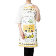 a woman wearing an apron with fruit on it and the words la provene written in french