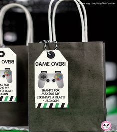 two bags with game over tags on them