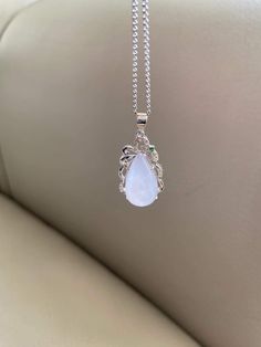 🌈 Water Drop Jadeite Jade Pendant, Light Lavender, S925 silver plate 🌷 Untreated Natural Jadeite/ Grade A Jade 🌷 Certified : YES 🌷 Jade from Myanmar/ Burma 🌷 100% handmade carving 🌷 Dimensions : ~18.6 x 10.6 x 8 mm 🌷 Color : Light Lavender 🌷 Including with S925 silver plate 🌷 The chain in the photos is for reference only, will not be included in the shipment 🌷 Free standard shipping from Hong Kong with tracking included 🌷 Take approximately 7-21 days to arrive worldwide ❤️ In Chinese Lavender Jade Jewelry, Elegant Chalcedony Jewelry For Anniversary, White Jade Jewelry For Wedding, Elegant Chalcedony Gemstone Jewelry, Elegant Natural Chalcedony Gemstones, Elegant White Jade Jewelry, Elegant Moonstone Drop Necklace, Elegant Jade Gemstones Natural Stones, Elegant Natural Jade Gemstones