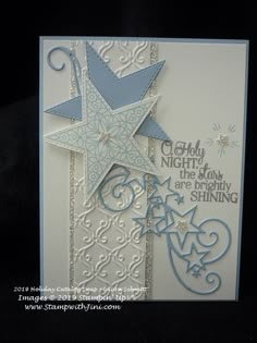 a christmas card with an ornament and star