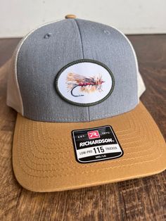 This unique fly fishing print stitch patch hat will be the perfect on trend gift for the outdoorsman in your life! Richardson 115 Snapback Trucker Style Hat.  Fly Fishing hat for men Fishing gift for men Christmas gift for husband Christmas gift for son Hat for son Hat for men Print Stitch patch hat Print Stitch patch hat Fishing gift Gift For Husband Christmas, Fishing Hats For Men, Husband Christmas Gift, Christmas Gift For Husband, Men Christmas Gift, Men Fishing, Stitch Hat, Fishing Hats, Stitch Patch