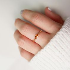 14k Gold Citrine Ring, 14k Gold Dainty Marquise Citrine Ring, 14k Gold Minimalist Citrine Ring, Stacking Citrine Ring Marquise Citrine Ring ✦ Product Features: ● Made to order ● Materials: Solid Gold ● Gold Kt: 9K, 10K, 14K, 18K  ● Gold color: Rose Gold, White Gold, and Yellow Gold ● Setting: Natural Citrine ● Total number of stones: 1 ● Total Citrine ctw: 0.20 ctw  ● Band width: 1.10mm ● Ready to ship: 7-10 business working days (excluding weekends) ✦ Gemstone Certificate: ● Absolutely, if you wish to have a gemstone certificate, we are happy to provide it for you. There will be an additional certificate fee of USD 30 to get the gemstone certificate report. The gemstone certificate issuance is an International Gemstone Association Laboratory (IGA).    ✦ Customiszation: ● We would really l Fine Citrine Jewelry For Promise, Citrine Diamond Ring With Accent Stones For Gift, Open Birthstone Ring With Gemstone Accents For Promise, Fine Jewelry Orange Sapphire Anniversary Ring, Fine Jewelry Orange Diamond Ring, Yellow Gold Diamond Ring With Citrine, Orange Sapphire Ring For Anniversary, Promise Jewelry With Citrine In Prong Setting, Amber Rings With Prong Setting For Anniversary