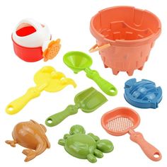 several plastic toys that are in the shape of buckets and spoons with lids