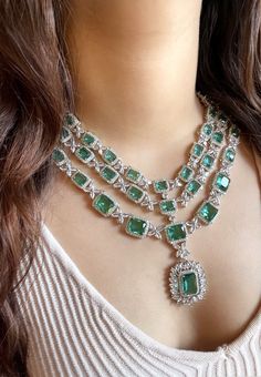 Add a touch of glamour and sophistication with this high quality necklace set in beautiful Teal green stones. The stones in this set bling and look close to the real thing. This set is sure to make heads turn!  It features an adjustable necklace and a pair of earrings. It can be paired perfectly with both ethnic and western outfits.  In case of any queries, please feel free to reach out. Happy shopping! Item includes Necklace and earrings Green Emerald Cut Emerald Necklace For Wedding, Emerald Cut Green Emerald Necklace For Wedding, Wedding Emerald Cut Green Emerald Necklace, Luxury Emerald Necklace For Wedding, Luxury Emerald Cut Necklace For Wedding, Luxury Emerald Cut Emerald Necklace For Wedding, Exquisite Emerald Wedding Necklace, Wedding Bridal Necklace With Cubic Zirconia Stones, Emerald Stone Necklaces For Weddings