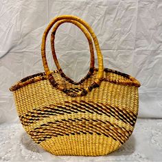 100% Handmade Tote Basket Bag. Made In Ecuador With Paja Toquilla. Brand New. Perfect Condition. Tan Color With Brown Details. Eco-friendly Woven Brown Shoulder Bag, Brown Basket-shaped Straw Bag With Top Carry Handle, Eco-friendly Handwoven Brown Bucket Bag, Artisan Brown Vegetable-tanned Shoulder Bag, Brown Handwoven Basket-shaped Bucket Bag, Basket Tote, Handmade Tote, Basket Bag, Tan Color