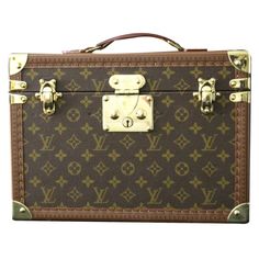 This Louis vuitton beauty case features monogram canvas and all brass fittings.Its main lock as well as its 2 latches are in solid brass and are stamped Louis Vuitton.  All studs are marked Louis Vuitton. Its large and comfortable top leather handle is embossed Louis Vuitton too.  Its interior is all beige coated canvas, with adjustable leather straps for holding materials. It still has got its removable little suitcase with a mirror under its lid. It also still has its original Louis Vuitton serial number label.It is very clean and fresh. It comes with its 2 working keys.  It is all original complete and in very good condition.  It could be used for traveling in style but can also turn into a perfect high end decoration piece.    Designer: Louis Vuitton  Brand: Louis Vuitton  Dimensions: Blanket Chest, Train Case, Beauty Case, Decoration Piece, Brass Fittings, Comfortable Tops, Monogram Canvas, Travel Style, Leather Handle