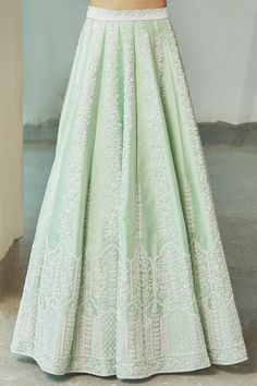 Green lehenga with floral and Mughal embroidered motifs. Paired with embroidered off shoulder blouse and embroidered dupatta.
Component: 3
Pattern: Embroidered
Type Of Work: Floral, Mughal
Neckline: Off Shoulder
Sleeve Type: Cap Sleeves
Color: Green
Other Details: 
Floral motifs
Bead and sequin work
Closure:
Blouse: Side zip
Occasion: Wedding,Bride - Aza Fashions Designer Wear Floor-length Chikankari Embroidery Sets, Designer Chikankari Embroidery Floor-length Set, Festivals Gown With Chikankari Embroidery For Reception, Traditional Semi-stitched Gown With Chikankari Embroidery, Chikankari Embroidered Gown For Reception And Festivals, Traditional Gown With Chikankari Embroidery, Chikankari Embroidery Gown For Reception And Festivals, Festival Gown With Chikankari Embroidery For Reception, Traditional Festive Gown With Chikankari Embroidery