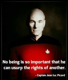 a man with a red laptop on his chest and a quote from captain jean picard